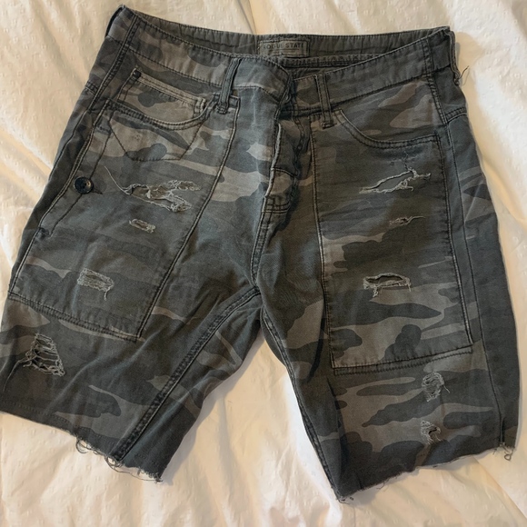distressed camo shorts